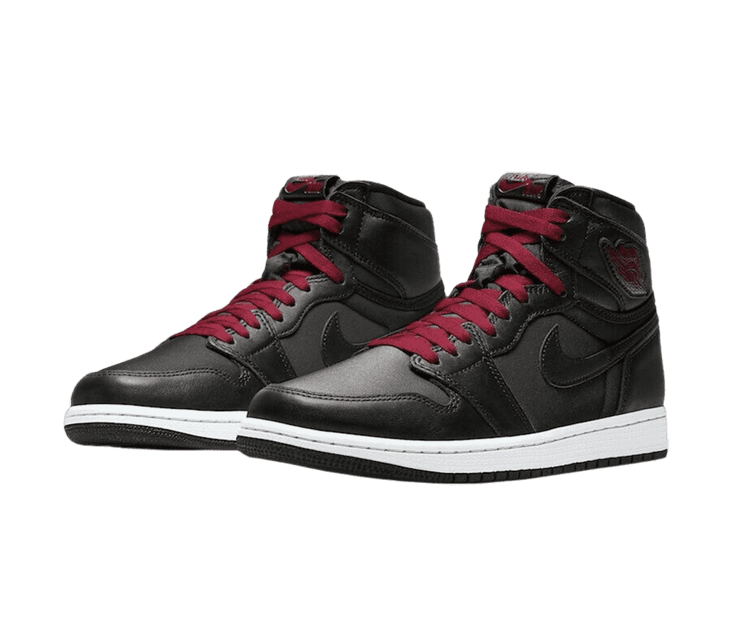 A black leather pair of AJ1 sneakers with white midsoles and burgundy laces.