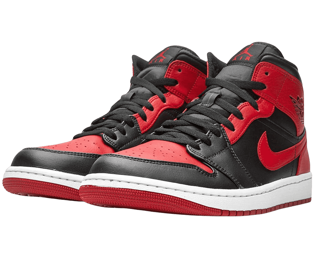 A pair of AJ1 Mid “Banned” sneakers in black and red leather.