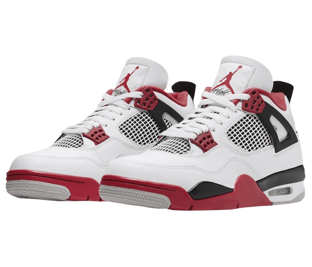 A white pair of AJ4 sneakers in suede, plastic netted sections on the sides and lower tongue, lace cages, and black, red, and gray soles.
