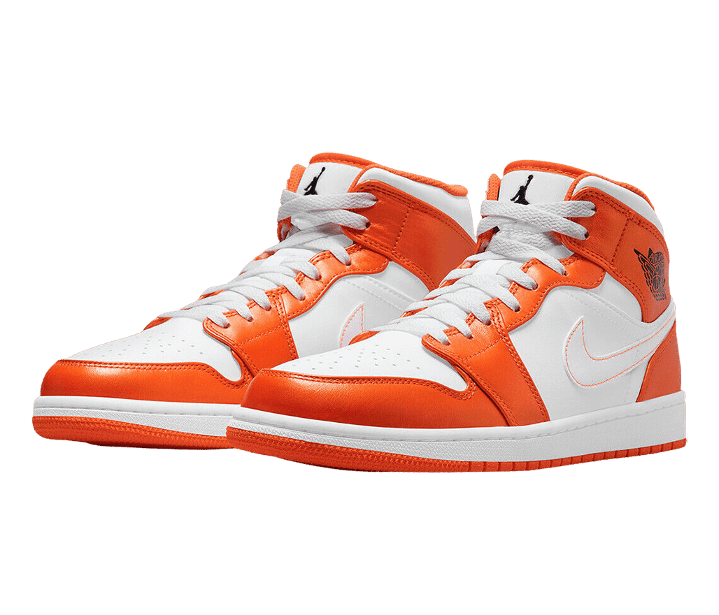A white pair of AJ1 sneakers with bright orange overlays and white Swooshes.