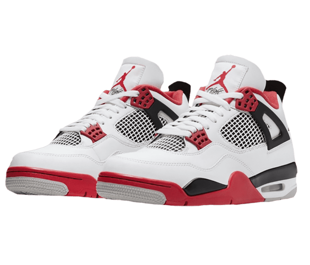 A white pair of AJ4 “Fire Red” sneakers with black and red detailing.