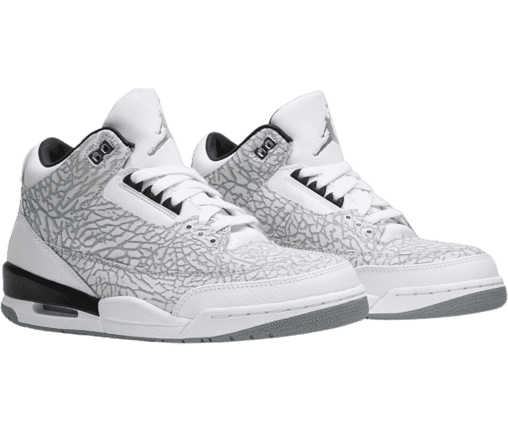 A white pair of AJ3 “Flip” sneakers with gray outsoles, light gray elephant print overlays covering most of the shoes, and a chrome Jordan logo on the tongue.