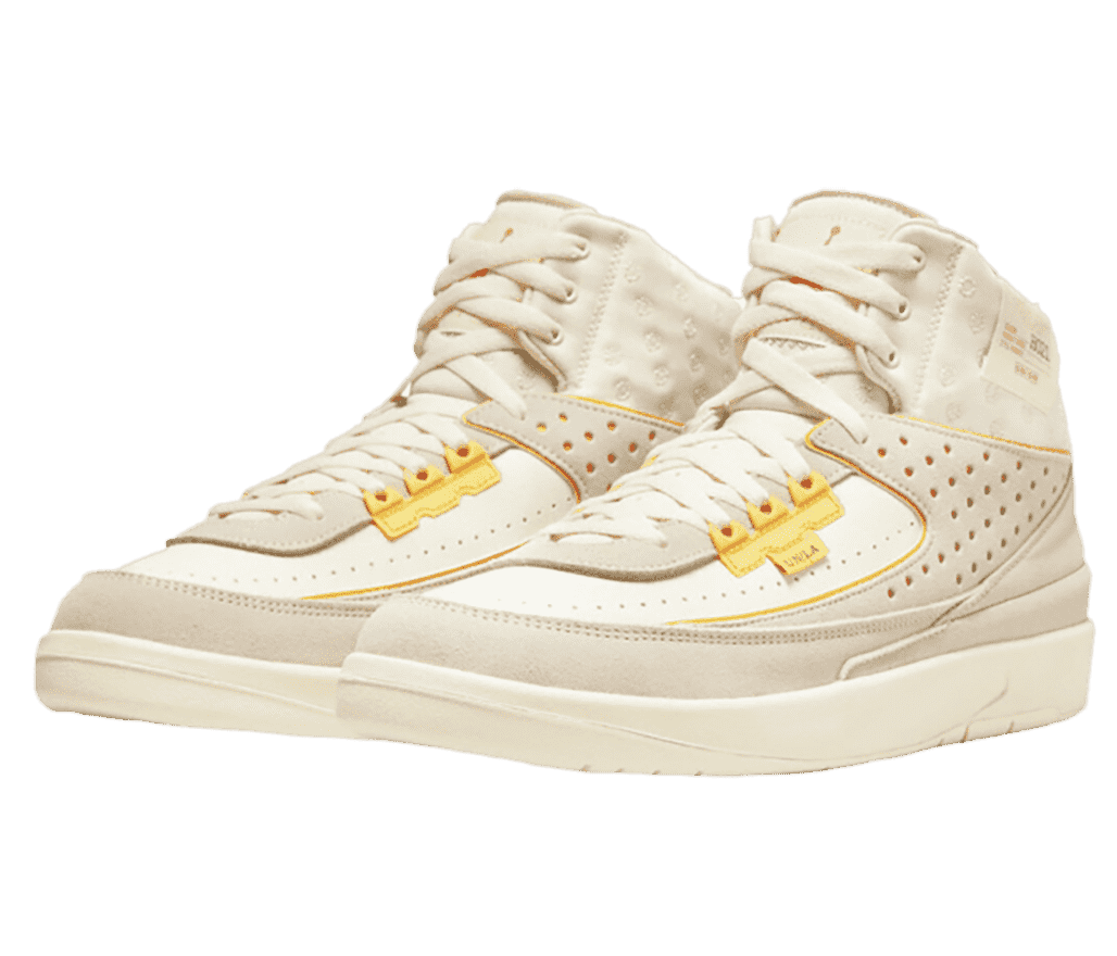 A pair of Union LA x AJ2 Retro SP sneakers with a tan textile upper, suede overlays, and perforated detailing on the sides.