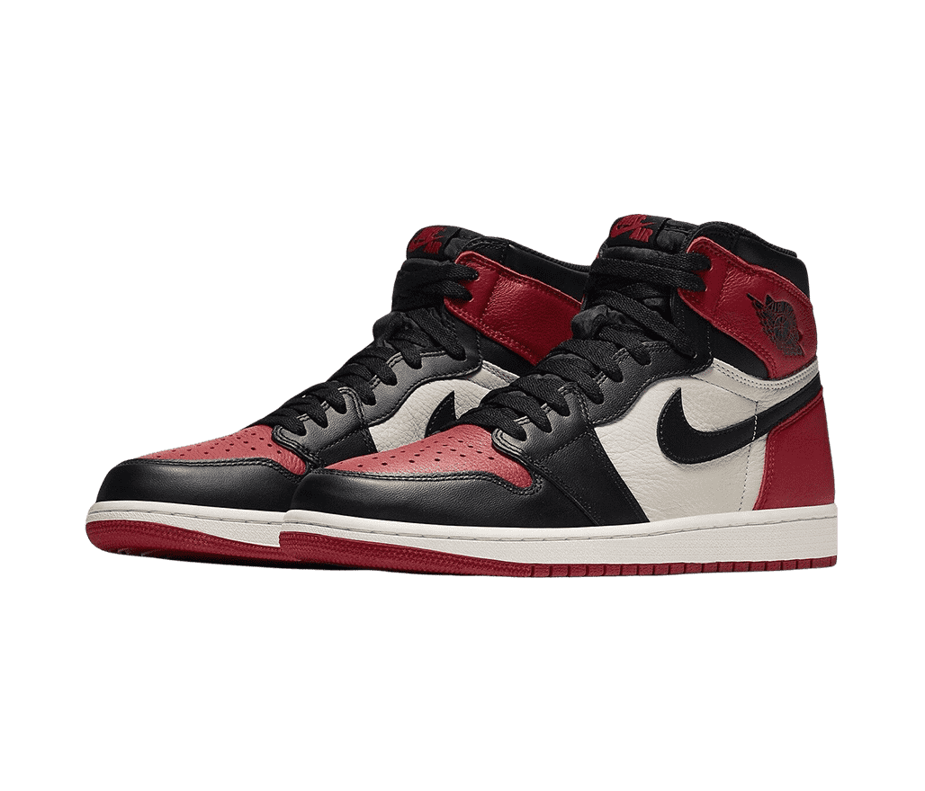 A pair AJ1 “Bred” sneakers with black quarters, toeboxes, and laces, red overlays and outsoles, and white midsoles.