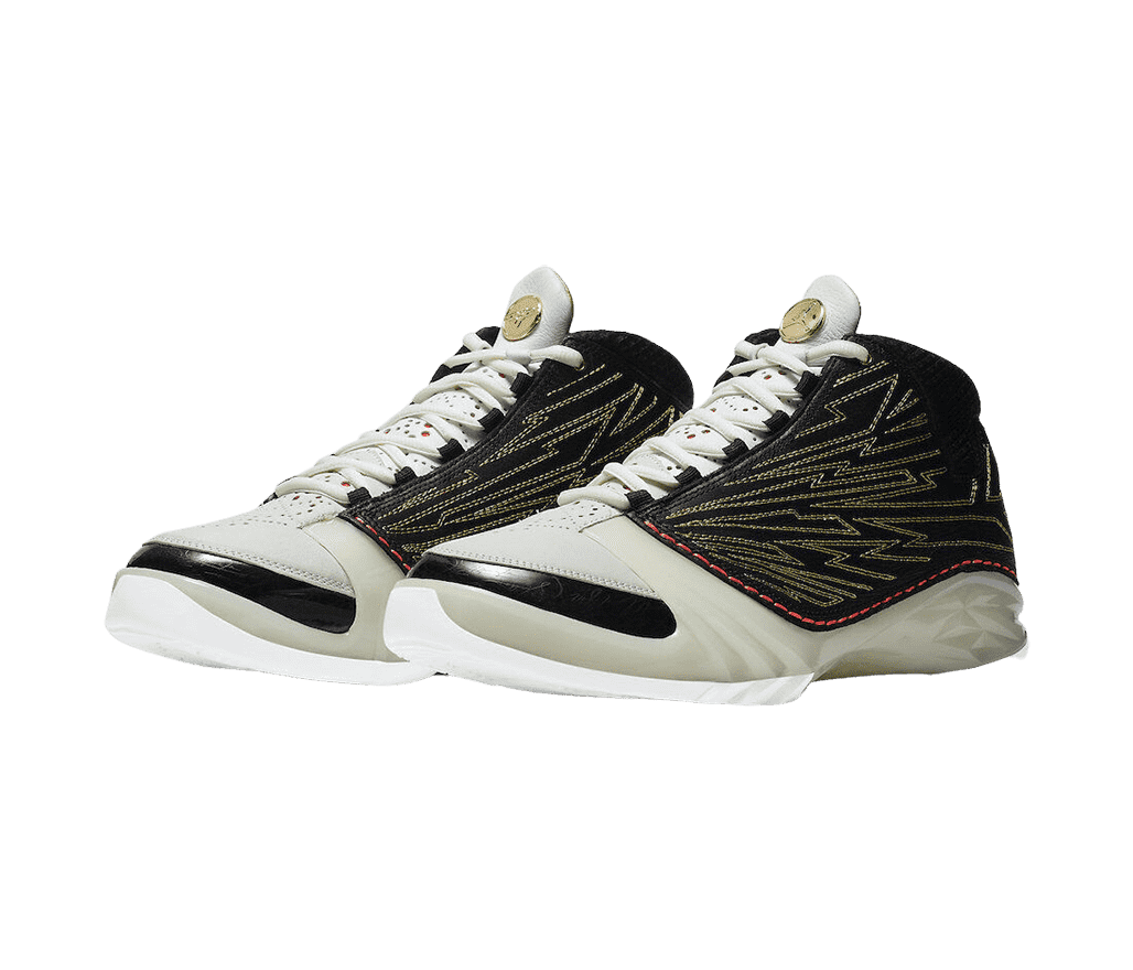 A pair of Titan x AJ23 retro sneakers in black, white, metallic, and gold. Lightning patterns cover the top black portion of the shoe.