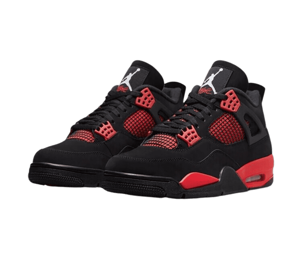 A black suede pair of AJ4 “Red Thunder” sneakers with black netted sections on top of red on the sides and lower tongue, red lace cages and midsoles, and black outsoles.