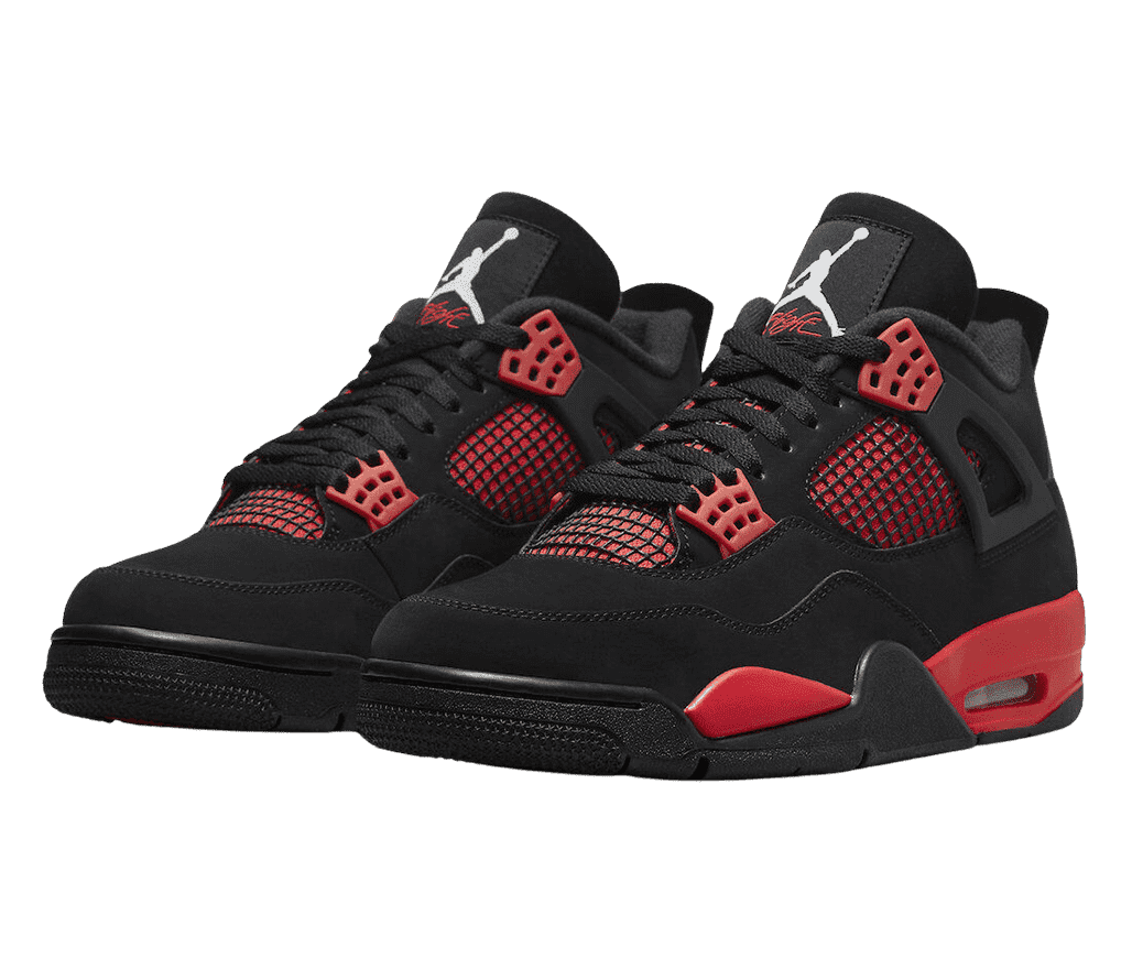 A black suede pair of AJ4 “Red Thunder” sneakers with black netted sections on top of red on the sides and lower tongue, red lace cages and midsoles, and black outsoles.