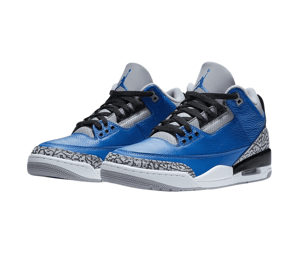 A blue pair of AJ3 “Varsity Royal” sneakers with gray outsoles and tongues, black and gray elephant print tips and heels, and blue Jordan logo.