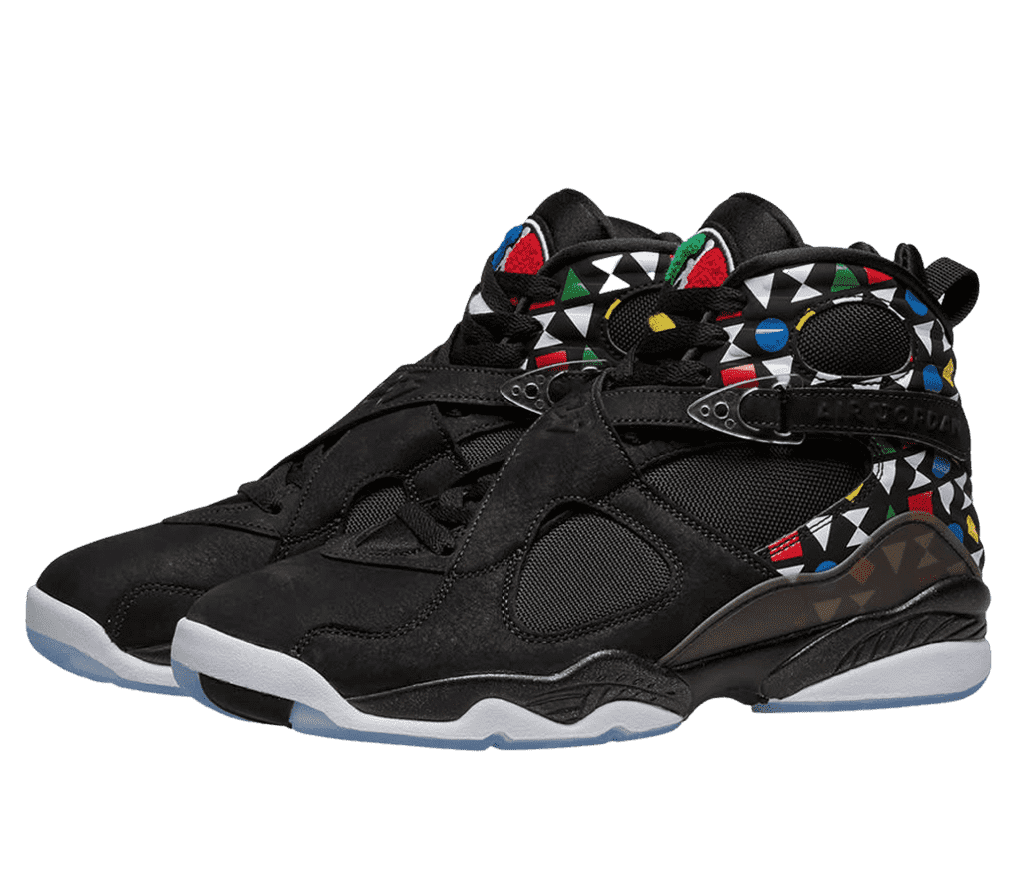 A black pair of AJ8 “Quai 54” sneakers with a multicolored geometric pattern accenting the heels and collars and a blue translucent outsole.