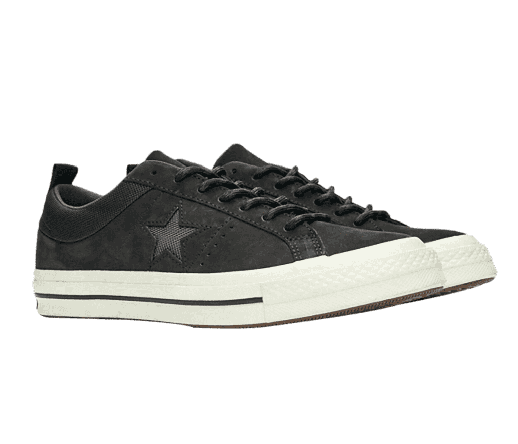 A pair of Converse One Star sneakers in black with white soles.