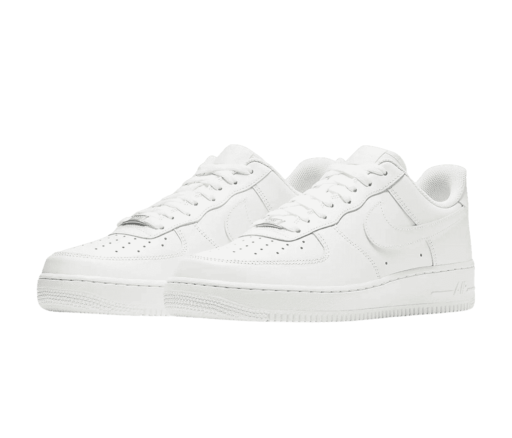 A pair of Nike AF1 Low sneakers in all-white felt, rubber soles, and chrome tags on the laces.