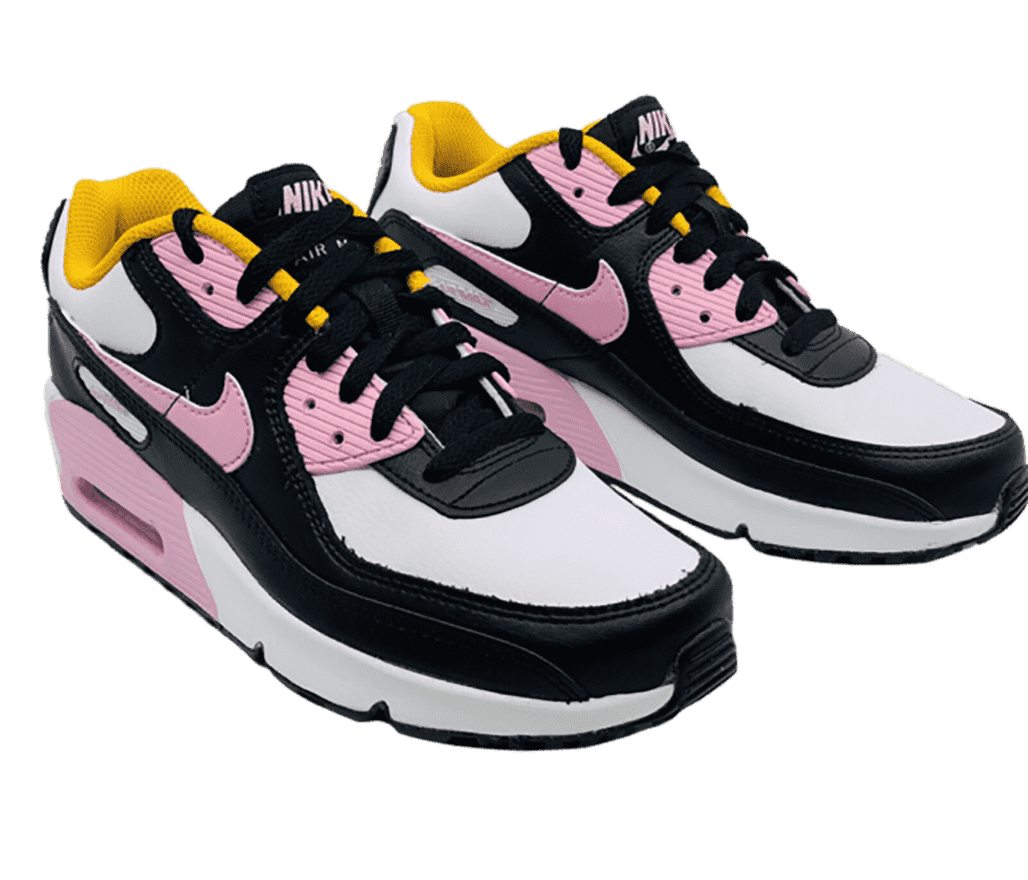 A pair of Nike Air Max 90 LTR “Arctic Pink” in pink, black, and white with golden yellow lining.