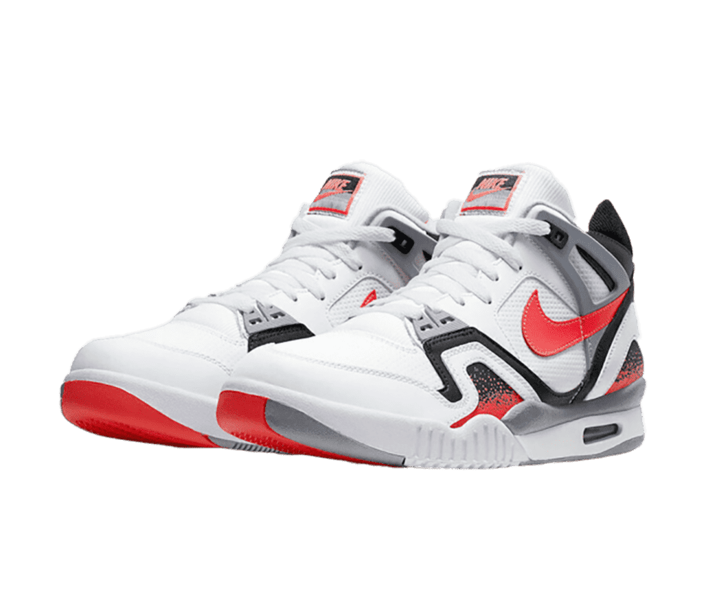 A white pair of Nike Air Tech Challenge 2 “Hot Lava” sneakers with bright red sections and splash patterns against black and gray detailing.