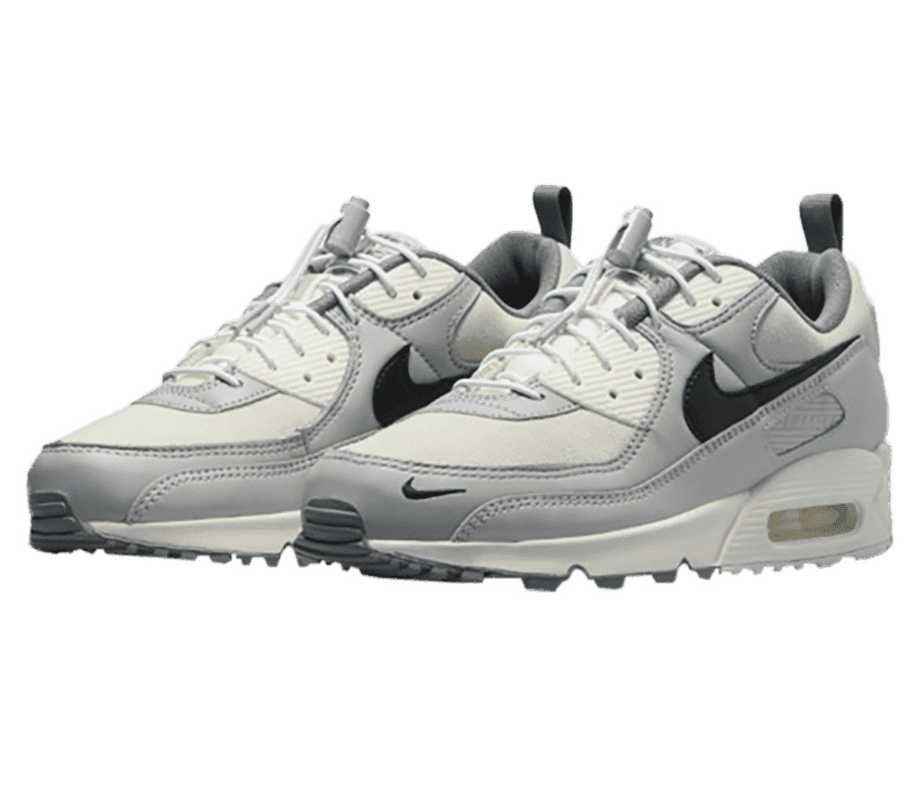 A pair of Nike Air Max 90 SE “Hangul Day” in white, gray, black and light beige.