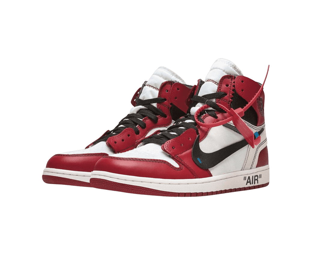 A pair of Nike x Off-White AJ1 “The 10” sneakers in white canvas, red leather overlays, black laces, a black leather Swoosh with blue stitching, and a red plastic zip-tie tag on the top lace.