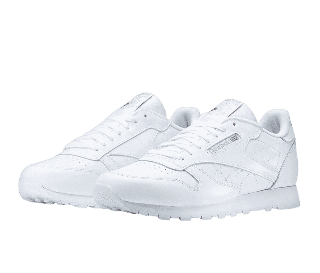 A pair of all-white Reebok Classic sneakers.
