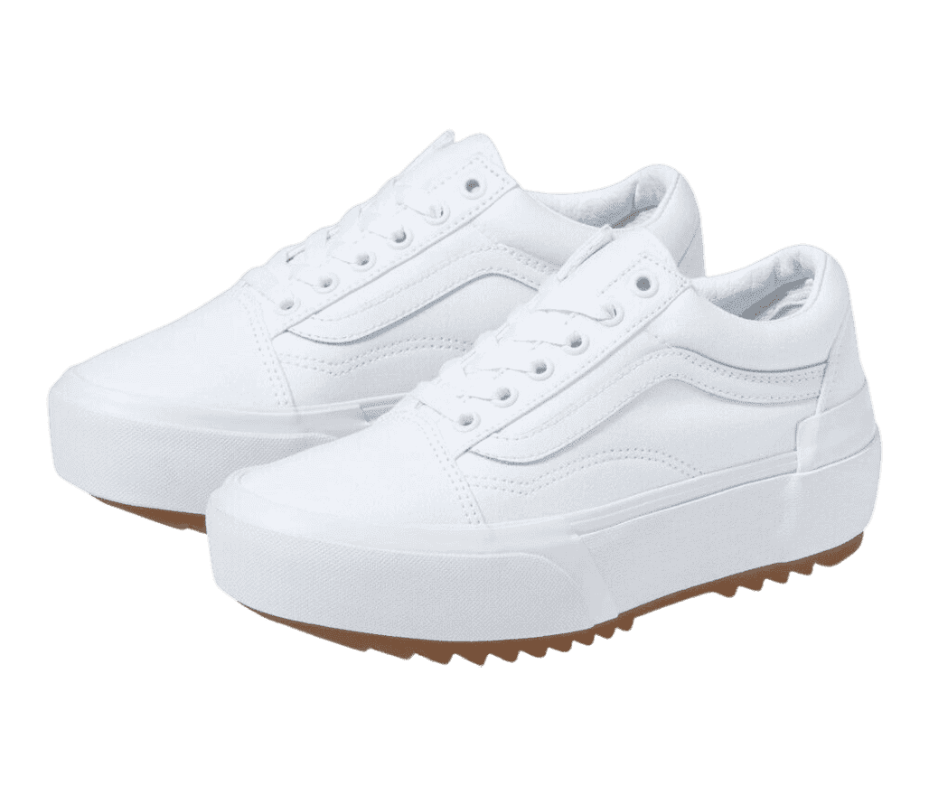 A pair of Vans Old Skool Stacked sneakers in all-white with zig-zagged gum bottoms.