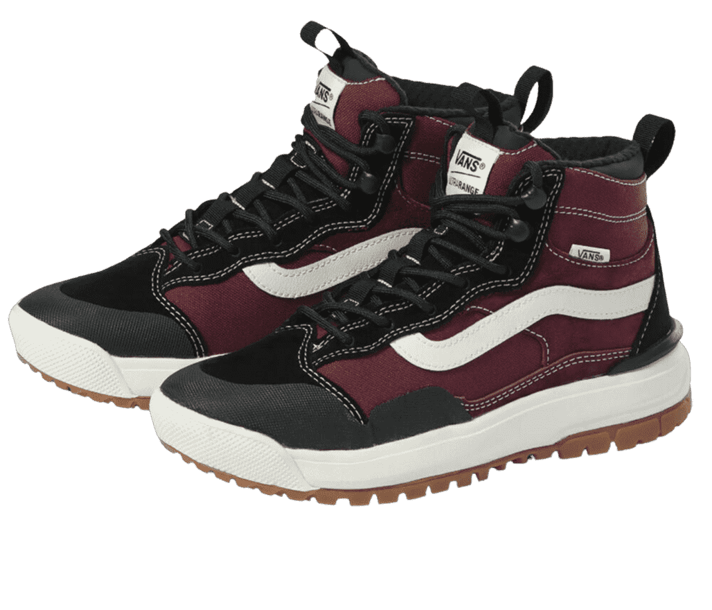 A pair of Vans UltraRange shoes in a burgundy suede, black overlays, white midsoles, and dark gum outsoles.