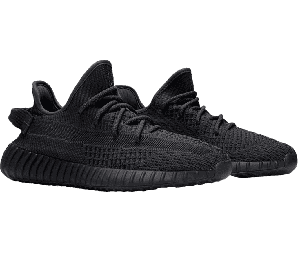 An all-black pair of Adidas YEEZY Boost 350 sneakers with vertically ribbed soles.